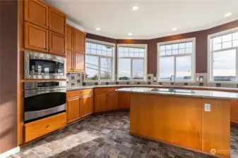 stove, lots of cabinets and great island.