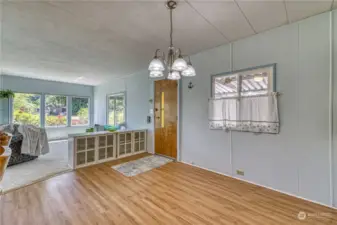 Open dining room and front door entry