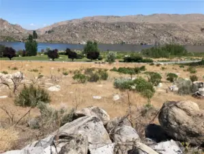 Lot 3 is perched above the community park and the river