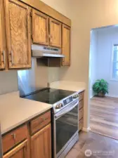 Kitchen with granite countertops and new stainless appliances