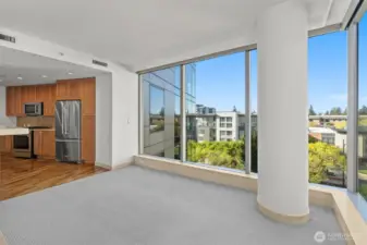 Walls of windows bring natural light pouring in.