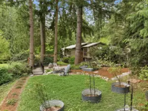 Rose garden, garden beds, fishing bridge...so many details!
