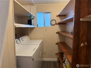 Laundry room w/new W/D and shelving