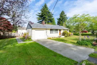 One car attached garage with ample driveway parking.