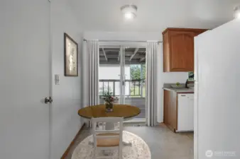 Slider door steps out to deck to maximize your entertaining space.