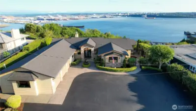 Welcoming guests in style, this home features ample parking and an elegant front entry that blends function with beauty.