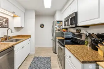 All appliances stay including the high-tech fridge.