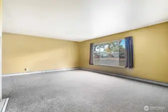 (Tenants furniture removed with AI). Step into a roomy living space filled with natural light.