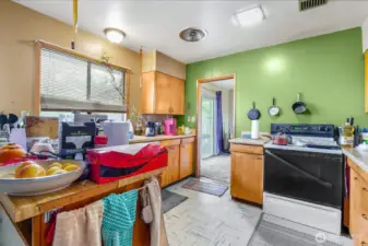 Spacious kitchen with ample counter and cabinet space.