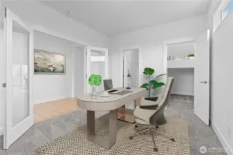 Downstairs presents a home office OR utilize as a 5th bedroom with dual walk-in closets!