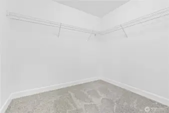 Primary Suite includes dual walk in closets.