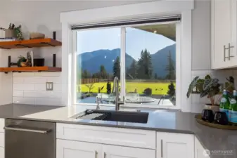 If you have to do dishes, you might as well have a view!  Just stunning views from every window.