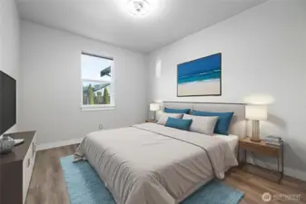 Main floor guest bedroom, virtually staged.