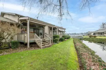 The BEST Condo in the Community!!!  Prime Location - BEST Views in the community!!! From your Deck, you sit right on Coffee Creek & have views of Spanaway Lake & Coffee Creek!!!