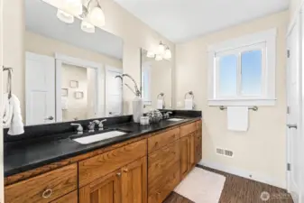 upstairs full bath, tub and toliet to the left