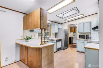 The kitchen is well laid out with plenty of room, not cramped at all.