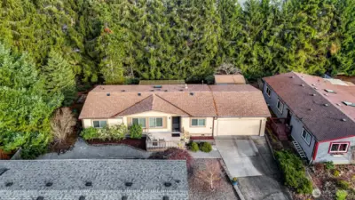 Tucked nicely in a private corner with a coveted large GARAGE!