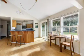 Eat-in kitchen w/breakfast bar allows for a front row seat to watch the cook in action!