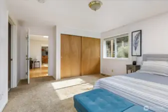 Open those closet doors to find an organized space for your clothes & a safe, too!