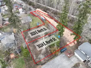 Property lines shown are approximate. Refer to survey in supplements. Corners are flagged.
