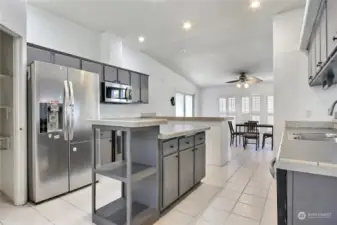 Step into the kitchen, the heart of the home, where the possibilities are as vast as your imagination. Don't forget the slider off the eat-in kitchen space, waiting to be opened to let in the sunshine and fresh air in. Newer dishwasher, stove and microwave.