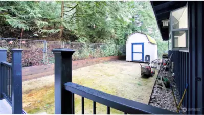 Rear patio with outbuilding