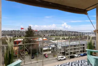 Enjoy the view from the balcony- the perfect blend for convenience with nearby transit, shops, groceries, restaurants and parks.