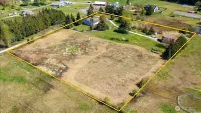 The property lines are approximate. There is also a portion on the right side of the shared driveway that is part of the property.
