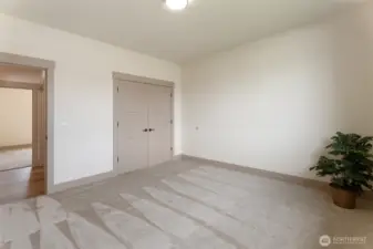 bedroom 2 in front of home with wardrobe closet