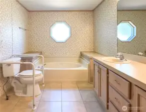 Primary bathroom with soaking tub. Not shown, a stand in shower and second sink