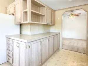 Access the dining room through the other side of the kitchen.
