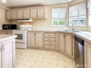 L shaped kitchen with so much storage space!