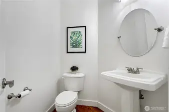 Conveniently located half bath for guests.