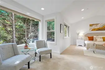 Sunlit and serene with room for a sitting area.