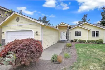 Situated on 65 feet of level, high-bluff waterfront…