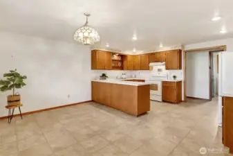 This classic traditional kitchen opens to a spacious dining room—perfect for everyday living and entertaining.