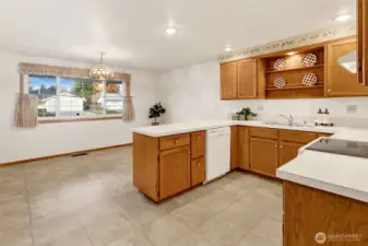 A large window over-looks the front porch bringing in light.
