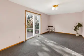 A separate family room is located directly behind the living room, it offers access to the back yard.