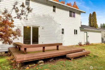 Generous backyard deck accessed from the family room.