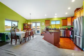 Warm vinyl plank kitchen flooring.