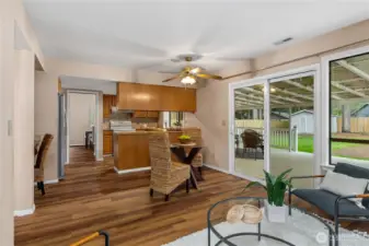 Family room has access to the back covered deck.