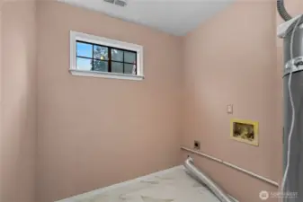 Laundry room on the main level.