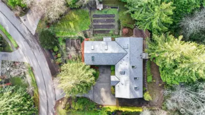 2 tax parcels boasting privacy, garden beds & privacy.