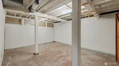 Extra room in full height partially finished basement