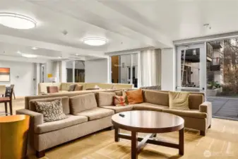 The thoughtfully designed community room is available for resident reservations, making it easy to entertain friends and family in a larger setting