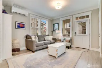 Additional seating and storage maximize this generous living space.