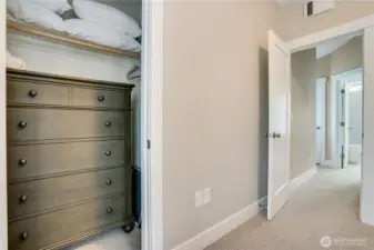 The primary closet offers generous storage.