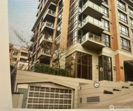 Includes 1 secured deeded   parking space at the Meridian located off the backside of the building on Terry Ave  .