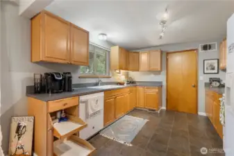Many lower cabinets feature pullout shelves.