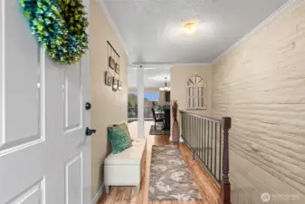 Tile entry leads to open floor plan